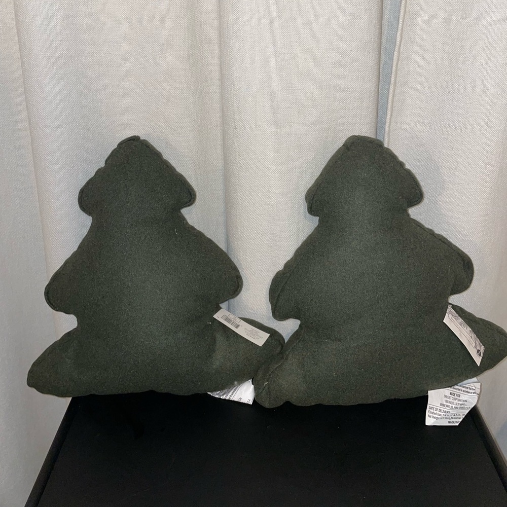 Two green Christmas tree pillows -target bullseye section
